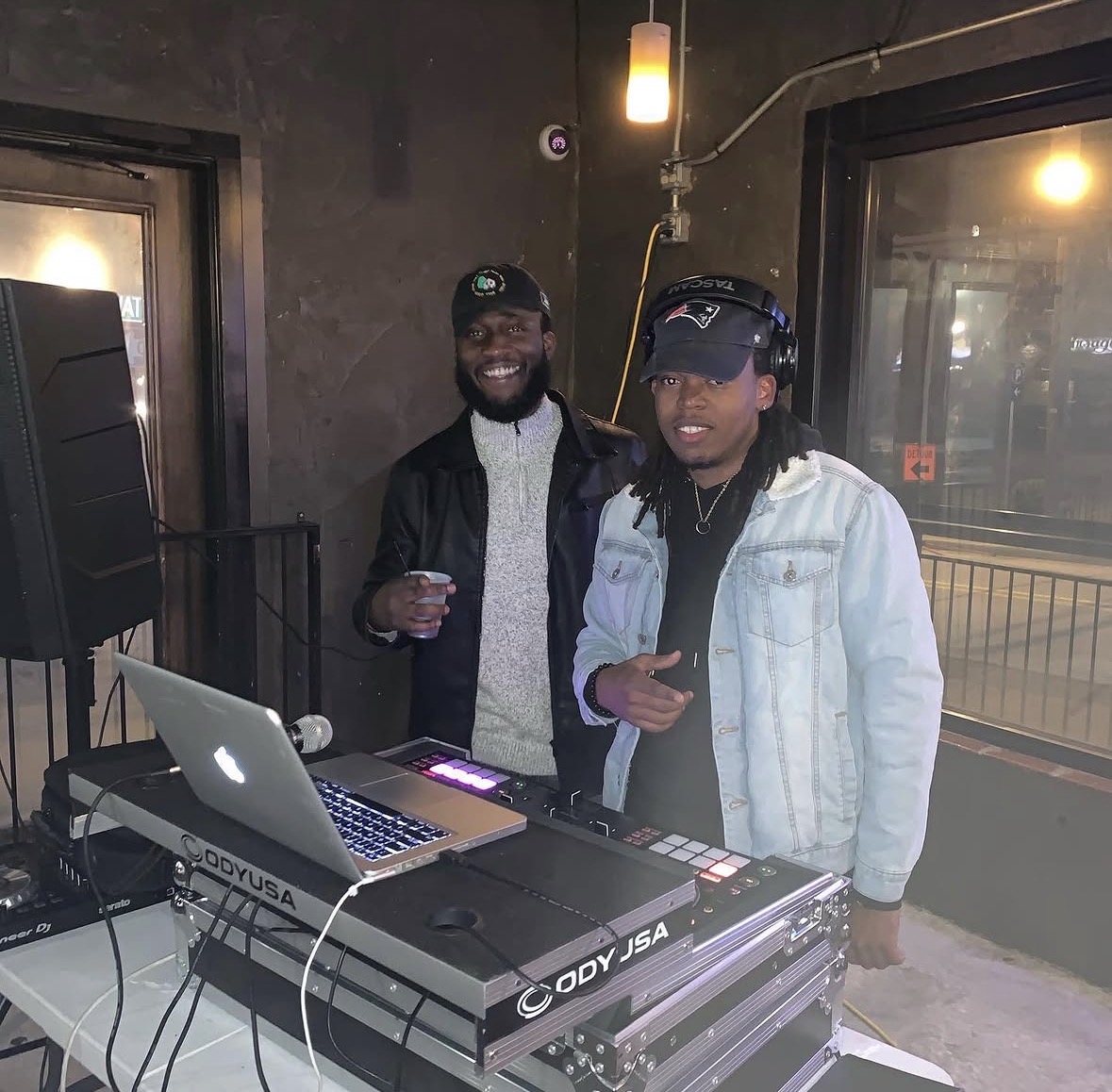The Redline Sounds team at the DJ booth